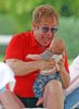 elton-john-and-child2-235x320.jpg